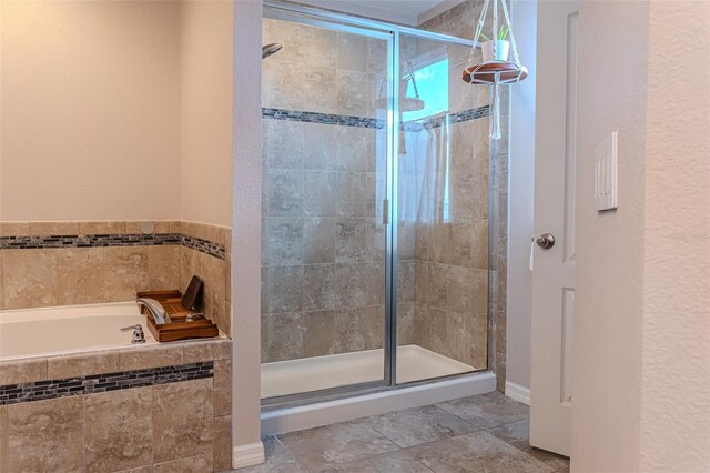 459 Millwood Pl, Winter Garden, FL 34787 - full bathroom with a stall shower, tile patterned flooring, and a garden tub