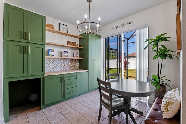570 Cascading Creek Ln, Winter Garden, FL 34787 - dining area featuring light tile patterned flooring and a chandelier