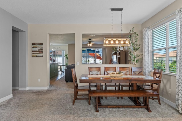 570 Cascading Creek Ln, Winter Garden, FL 34787 - carpeted dining space with baseboards and ceiling fan