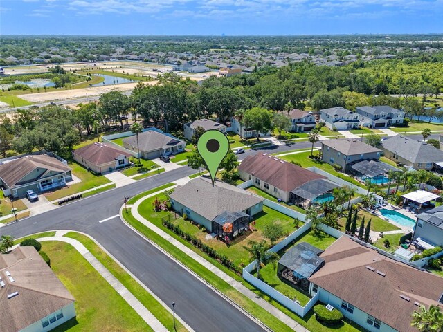 570 Cascading Creek Ln, Winter Garden, FL 34787 - aerial perspective of suburban area featuring a large body of water and a pool