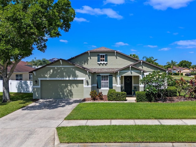 570 Cascading Creek Ln, Winter Garden, FL 34787 - view of front of home with a garage, concrete driveway, stucco siding, and a shingled roof