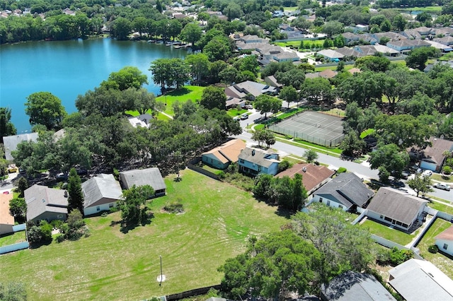 aerial perspective of suburban area featuring a large body of water