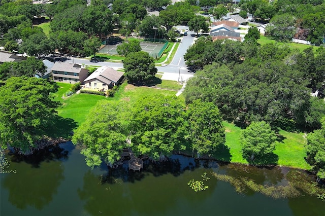 aerial perspective of suburban area featuring a nearby body of water