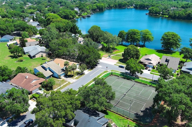 aerial perspective of suburban area featuring a nearby body of water