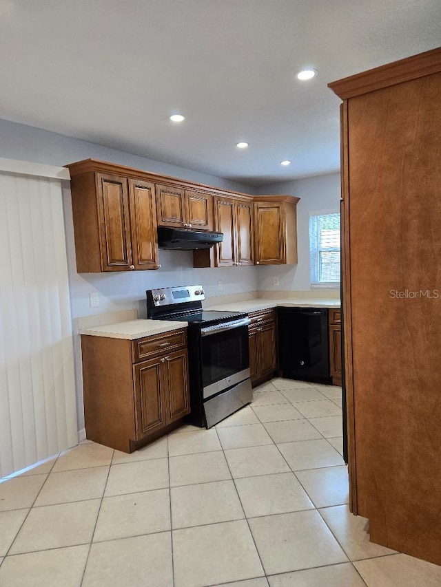 2828 Whispering Way, Winter Park, FL 32792 - kitchen featuring stainless steel range with electric stovetop, under cabinet range hood, black dishwasher, light countertops, and light tile patterned floors