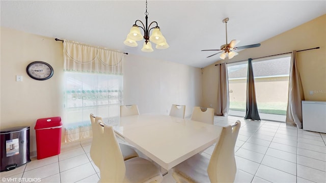 2108 Shannon Lakes Blvd, Kissimmee, FL 34743 - dining area featuring lofted ceiling, light tile patterned floors, a chandelier, and a ceiling fan