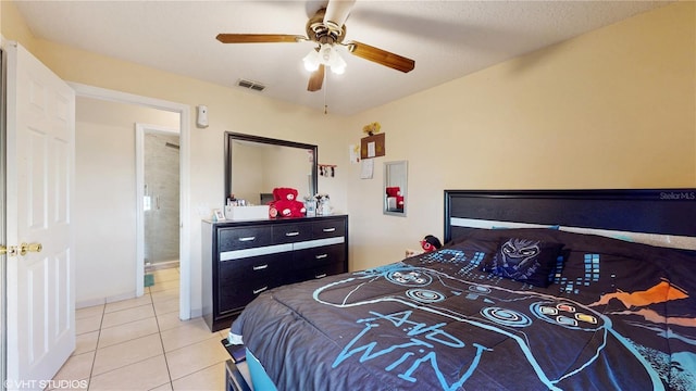 2108 Shannon Lakes Blvd, Kissimmee, FL 34743 - bedroom featuring light tile patterned floors and a ceiling fan