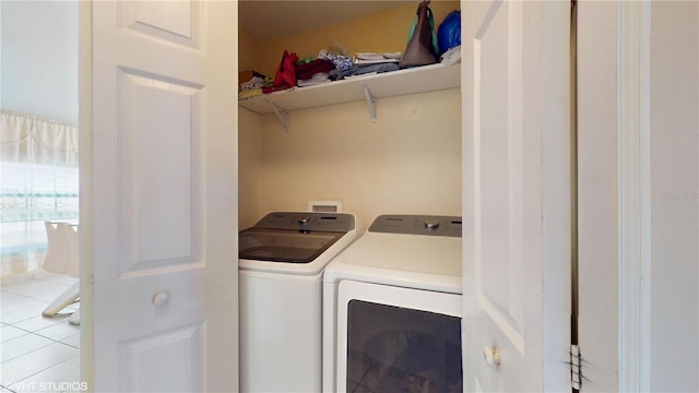 2108 Shannon Lakes Blvd, Kissimmee, FL 34743 - washroom with independent washer and dryer and tile patterned flooring