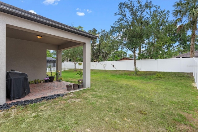 view of yard with a patio area