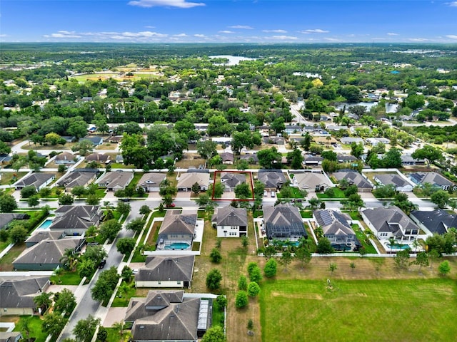 aerial view of residential area featuring property boundaries highlighted