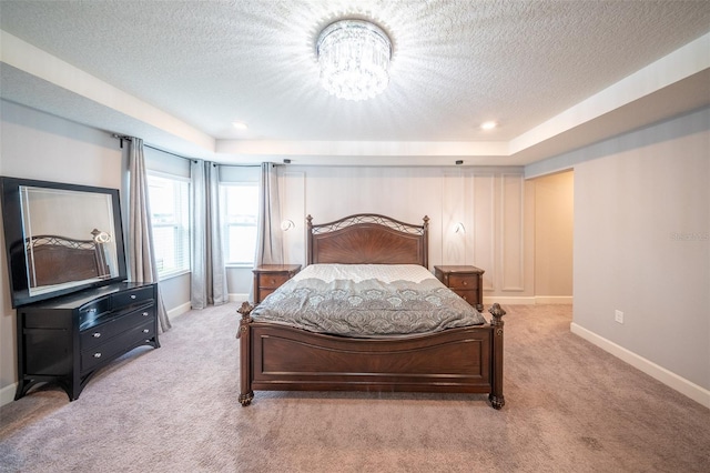 1631 Pontiff Pl, Davenport, FL 33896 - bedroom with carpet floors, a textured ceiling, a chandelier, baseboards, and recessed lighting