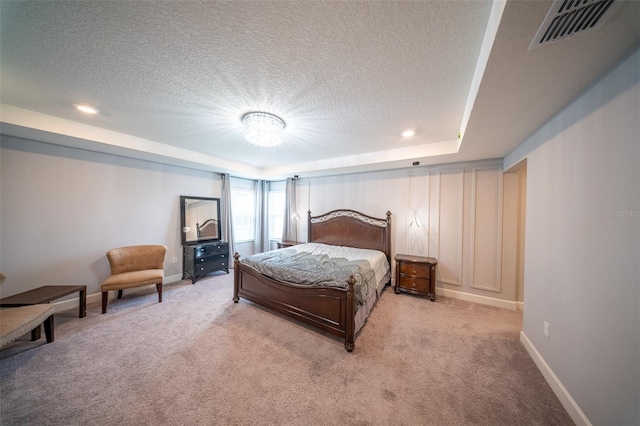 1631 Pontiff Pl, Davenport, FL 33896 - carpeted bedroom featuring a textured ceiling, baseboards, recessed lighting, and a raised ceiling