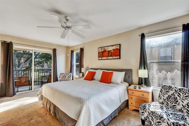 bedroom featuring access to outside, ceiling fan, and light colored carpet