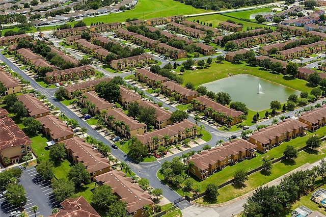 aerial view featuring a water view and a residential view