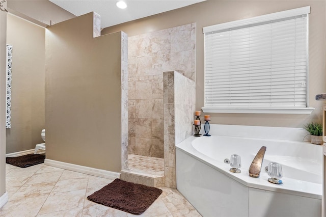 bathroom featuring a walk in shower, toilet, a garden tub, and baseboards