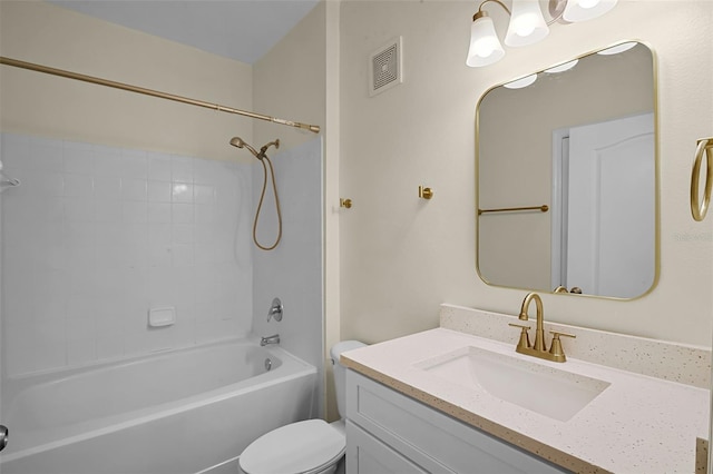 bathroom featuring toilet, visible vents, shower / bathing tub combination, and vanity