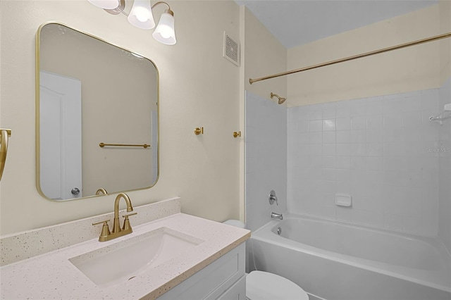 full bath featuring toilet, visible vents, vanity, and tub / shower combination