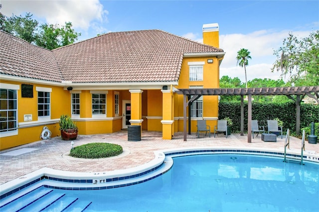 community pool featuring a patio and a pergola