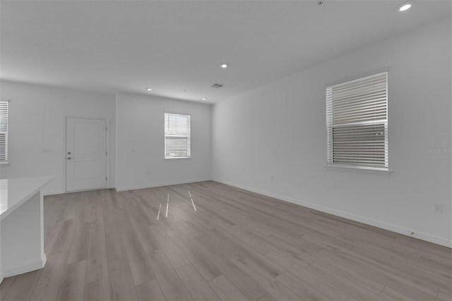305 Platform Ln, Debary, FL 32713 - unfurnished room featuring light wood finished floors, baseboards, and recessed lighting