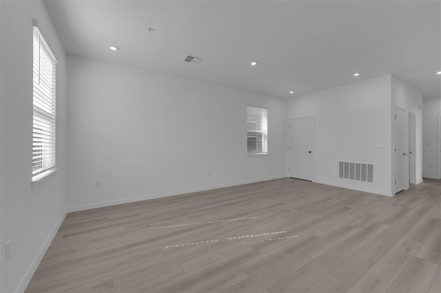 305 Platform Ln, Debary, FL 32713 - unfurnished room featuring light wood-style floors, visible vents, and plenty of natural light