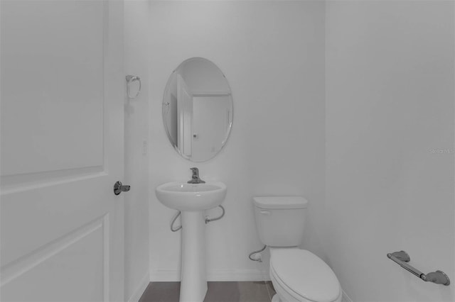 305 Platform Ln, Debary, FL 32713 - bathroom featuring toilet and baseboards