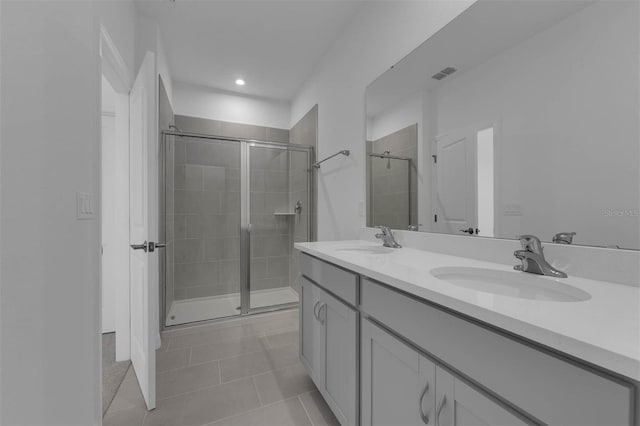 305 Platform Ln, Debary, FL 32713 - full bath featuring visible vents, tile patterned flooring, a shower stall, and a sink