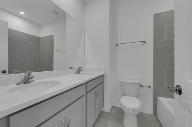 305 Platform Ln, Debary, FL 32713 - bathroom with a sink, double vanity, toilet, and visible vents