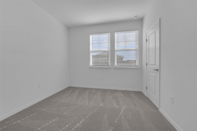 305 Platform Ln, Debary, FL 32713 - spare room featuring carpet floors and baseboards