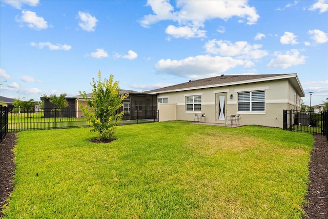 2524 Datura Loop, Saint Cloud, FL 34772 - back of house featuring stucco siding and a sunroom