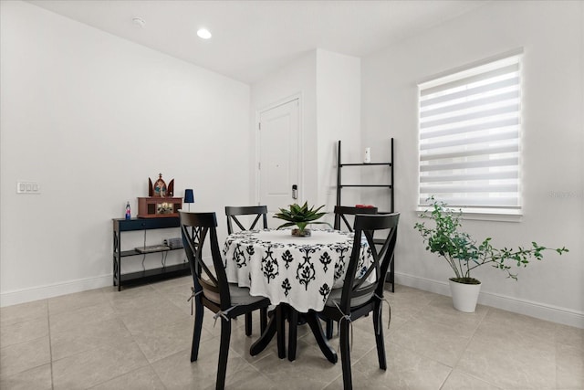 2524 Datura Loop, Saint Cloud, FL 34772 - dining area featuring baseboards, light tile patterned flooring, and recessed lighting