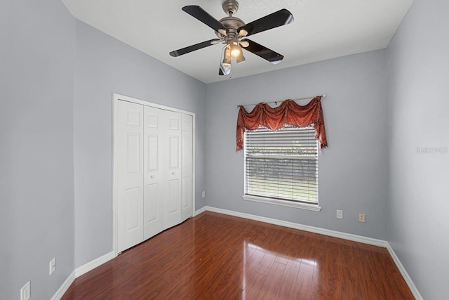 1802 Imperial Palm Dr, Apopka, FL 32712 - unfurnished bedroom with baseboards, wood finished floors, and a closet