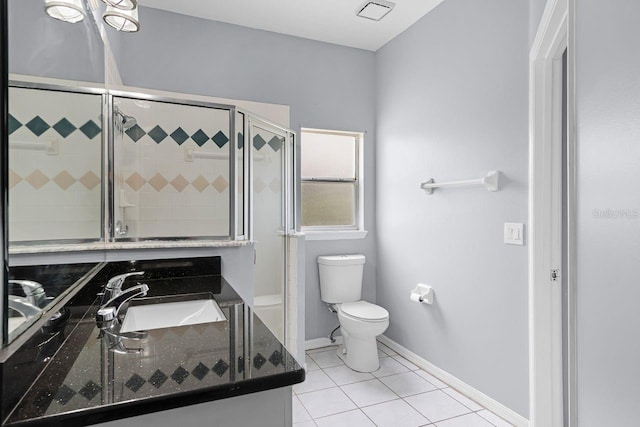 1802 Imperial Palm Dr, Apopka, FL 32712 - full bath with toilet, tile patterned floors, vanity, baseboards, and a shower with shower door