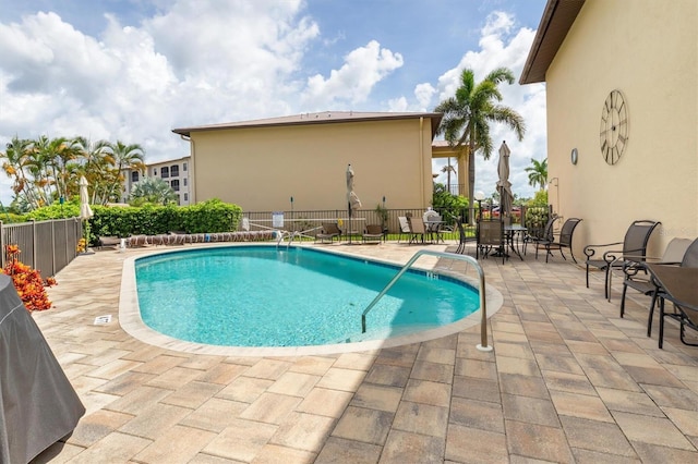 3221 White Ibis Ct Unit C1, Punta Gorda, FL 33950 - community pool with a patio area and fence