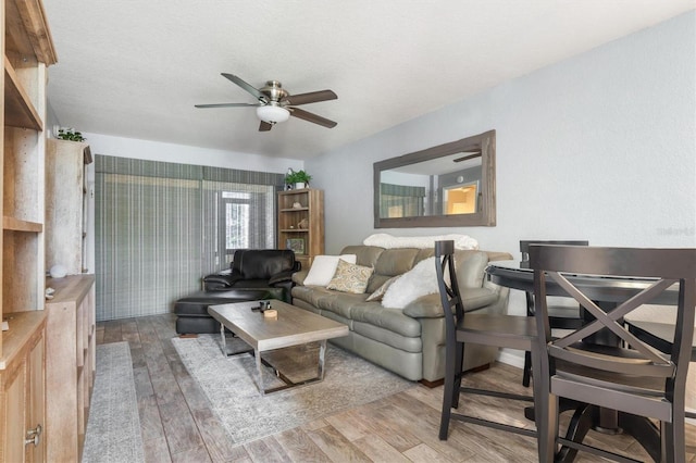 3221 White Ibis Ct Unit C1, Punta Gorda, FL 33950 - living area with a ceiling fan and wood finished floors