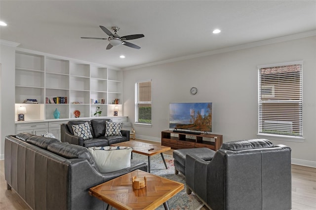 10819 Savona Way, Orlando, FL 32827 - living area with a ceiling fan, ornamental molding, baseboards, light wood-style floors, and recessed lighting