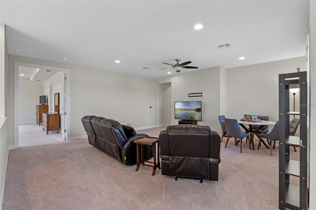 10819 Savona Way, Orlando, FL 32827 - living room with light colored carpet, recessed lighting, baseboards, and a ceiling fan