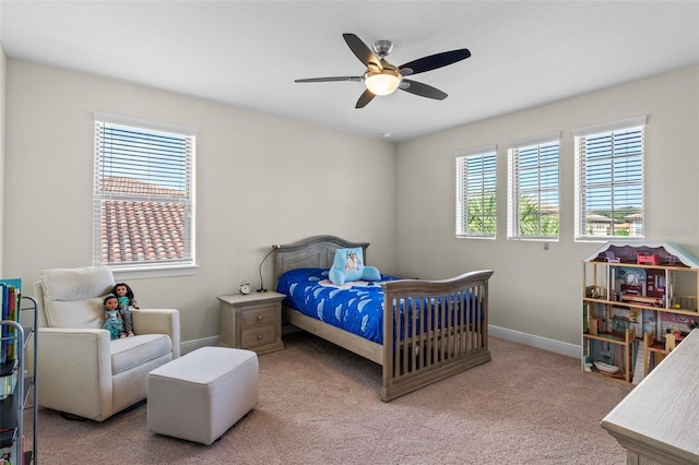 10819 Savona Way, Orlando, FL 32827 - bedroom with carpet, baseboards, and a ceiling fan