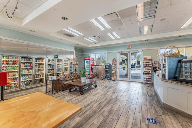 10819 Savona Way, Orlando, FL 32827 - interior space with a paneled ceiling, wood finished floors, and french doors