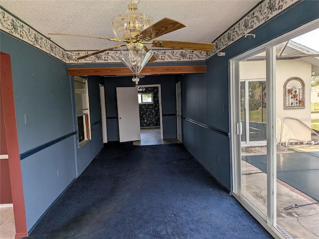 4299 Bullard St, North Port, FL 34287 - corridor featuring a textured ceiling