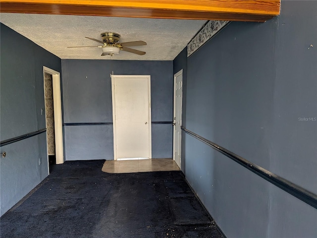 4299 Bullard St, North Port, FL 34287 - spare room featuring a textured ceiling and ceiling fan