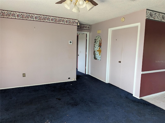 4299 Bullard St, North Port, FL 34287 - empty room with ceiling fan, carpet flooring, and a textured ceiling