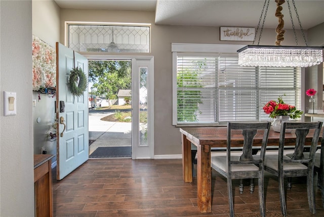 2623 Gables Dr, Eustis, FL 32726 - dining area featuring dark wood finished floors, healthy amount of natural light, and baseboards