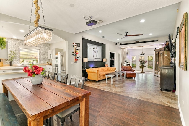2623 Gables Dr, Eustis, FL 32726 - dining room with ceiling fan, wood finished floors, recessed lighting, and baseboards