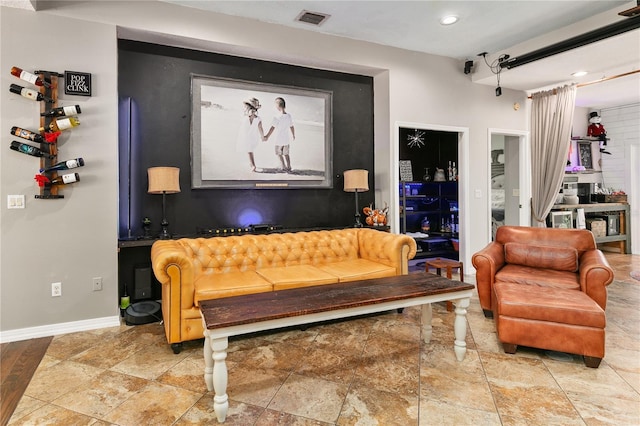 2623 Gables Dr, Eustis, FL 32726 - living area featuring recessed lighting, baseboards, and stone finish flooring