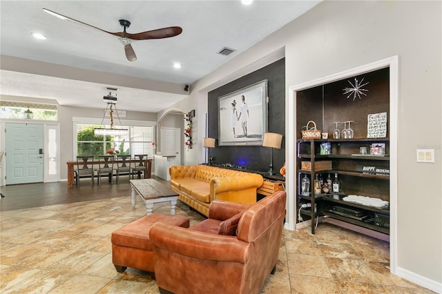 2623 Gables Dr, Eustis, FL 32726 - living area with a ceiling fan, light stone finish flooring, baseboards, and recessed lighting