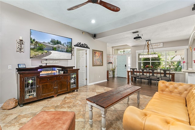 2623 Gables Dr, Eustis, FL 32726 - living area featuring baseboards and ceiling fan