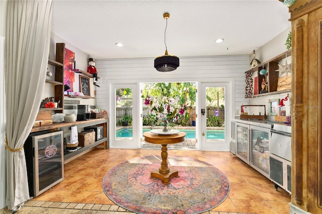 2623 Gables Dr, Eustis, FL 32726 - bar featuring healthy amount of natural light, recessed lighting, light tile patterned floors, and decorative light fixtures