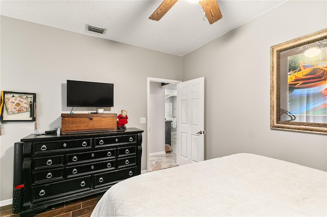 2623 Gables Dr, Eustis, FL 32726 - bedroom featuring baseboards, a ceiling fan, and wood finished floors