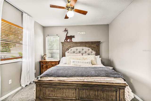 2623 Gables Dr, Eustis, FL 32726 - carpeted bedroom with baseboards and a ceiling fan