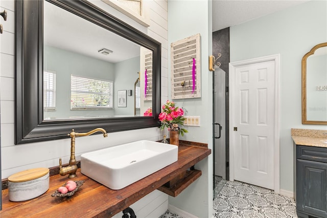2623 Gables Dr, Eustis, FL 32726 - bathroom featuring baseboards, tile patterned flooring, and vanity